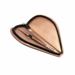 Nail pusher in rose gold case